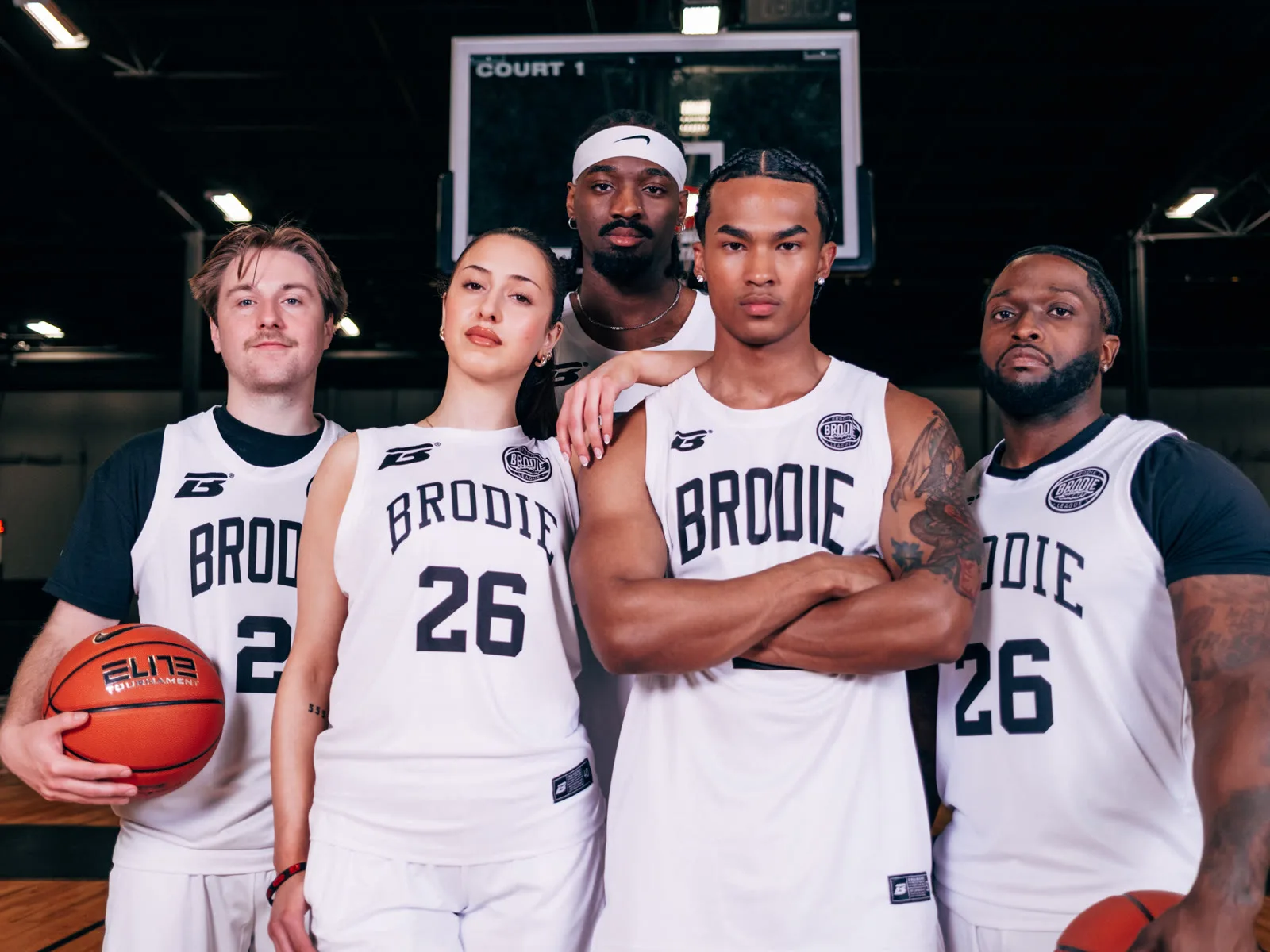 Brodie co-ed team lined up with arms crossed