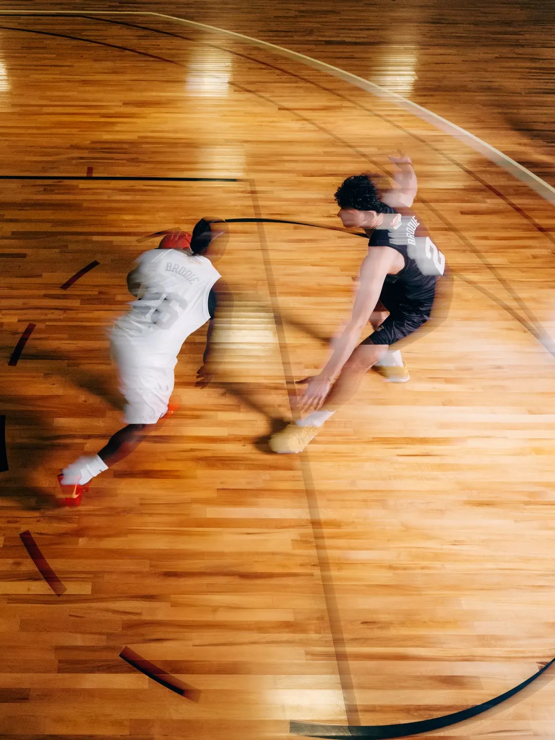 Two Brodie athletes playing one on one