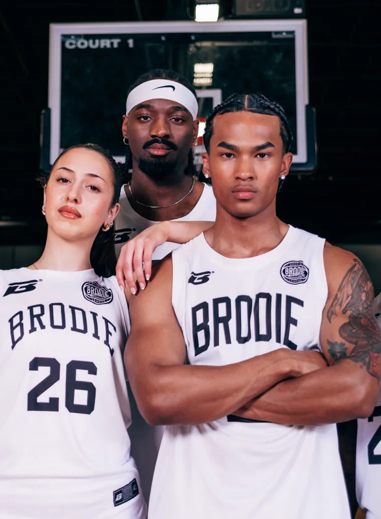 Brodie Co-Ed athletes in white jerseys