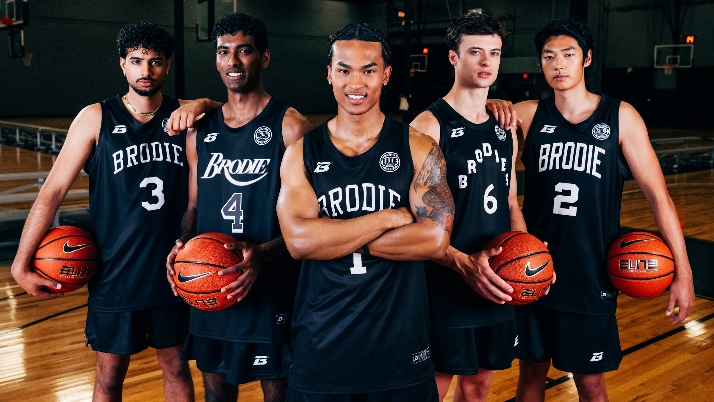 A BRODIE team of five in matching black jerseys, the captain in the middle