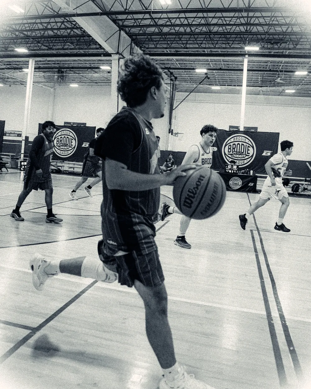 BRODIE athlete in a Vaughan jersey on court