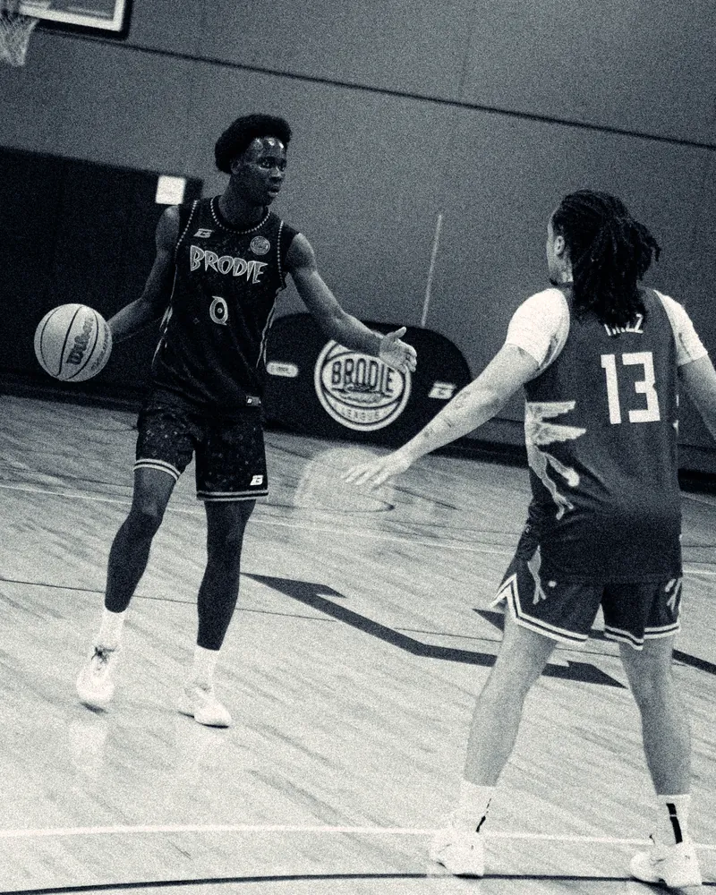 Two BRODIE athletes on court during a game