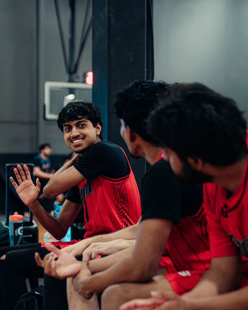 BRODIE teammates smiling on the bench