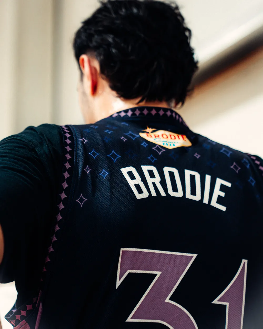 BRODIE athlete in a number 31 BRODIE jersey, seen from behind