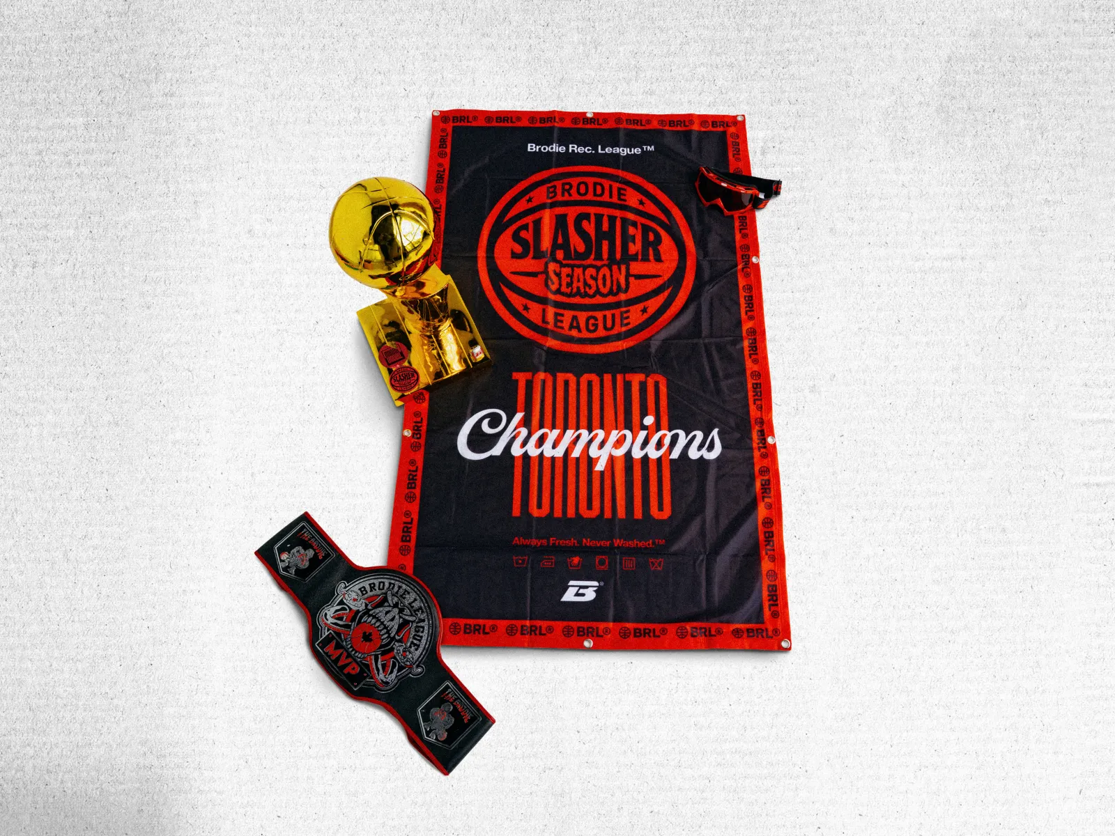 Brodie Champ Pack with the trophy, MVP belt and champions banner