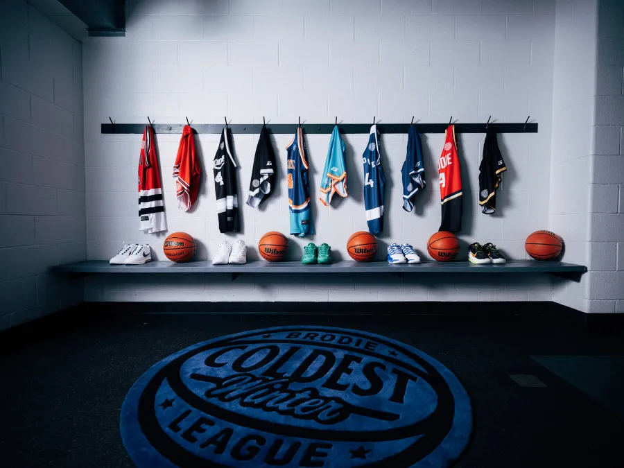 BRODIE Coldest Winter jerseys hanging in a locker room