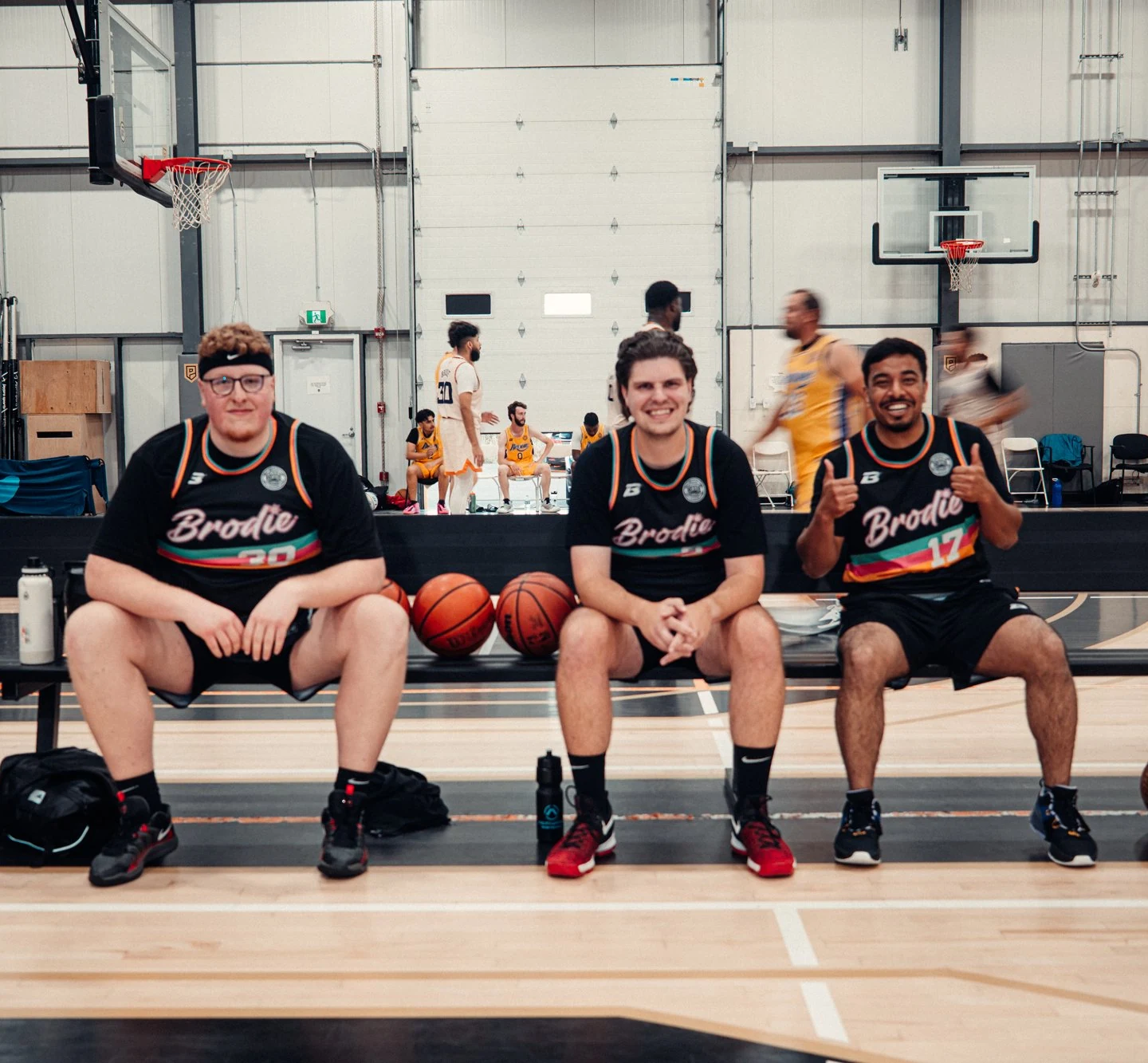 Three BRODIE athletes on the bench in Calgary