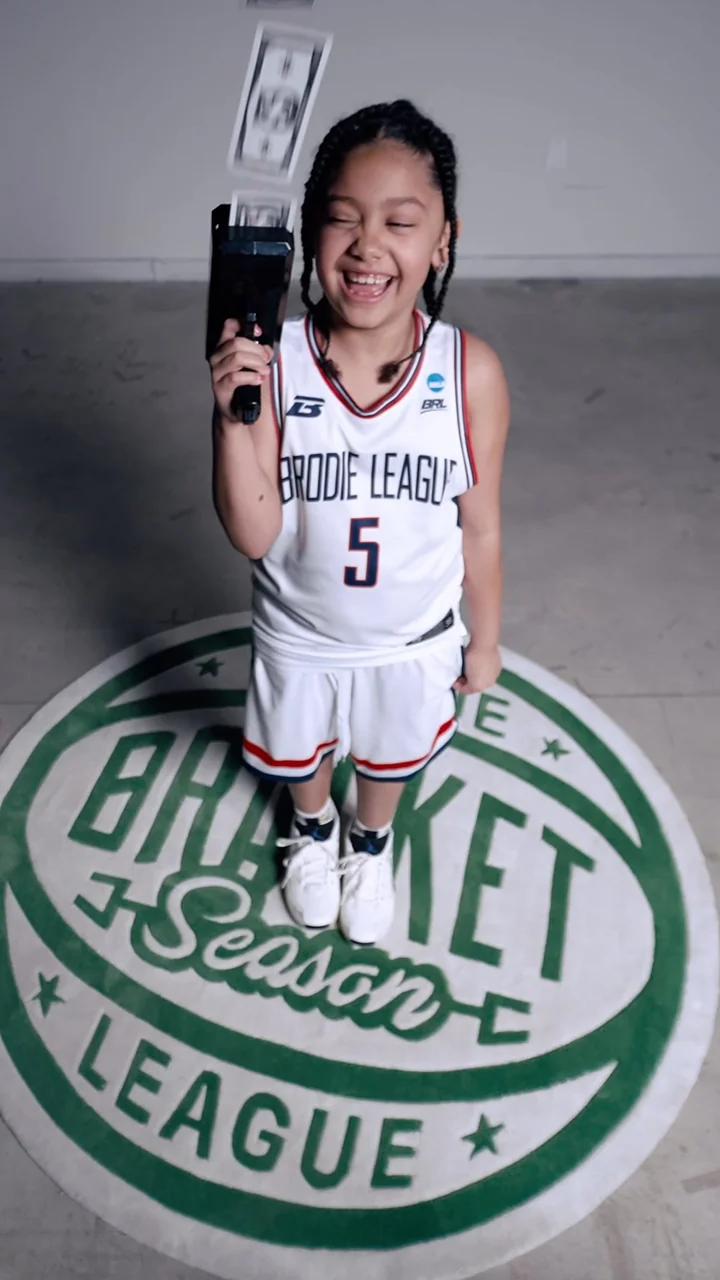 Still from the Bracket Season Money Gun film