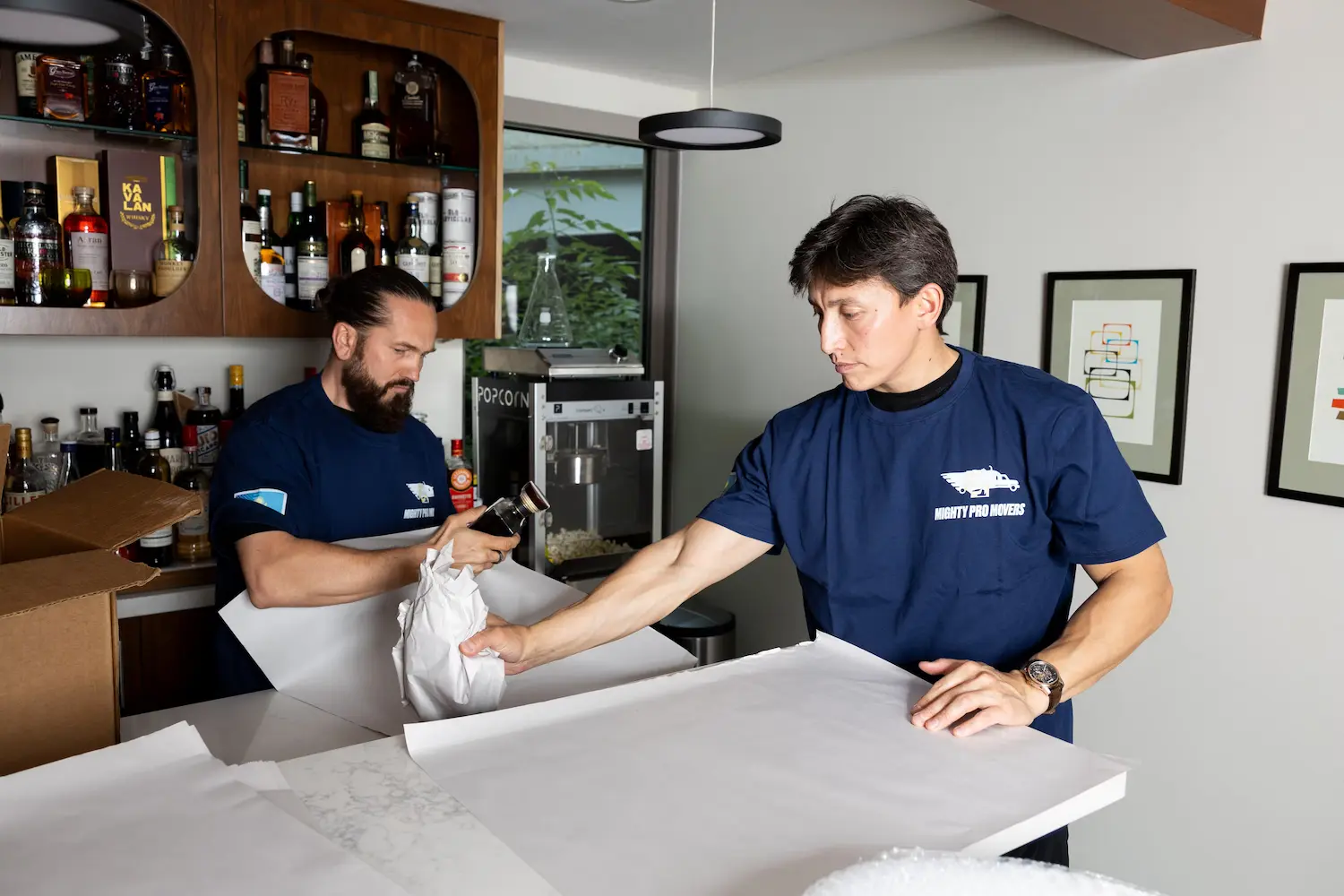 Local movers carefully handling belongings during relocation