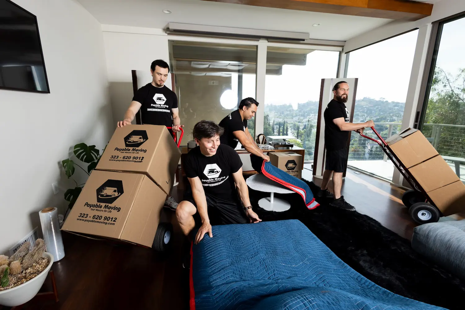 Furniture being loaded into a moving truck by trained movers