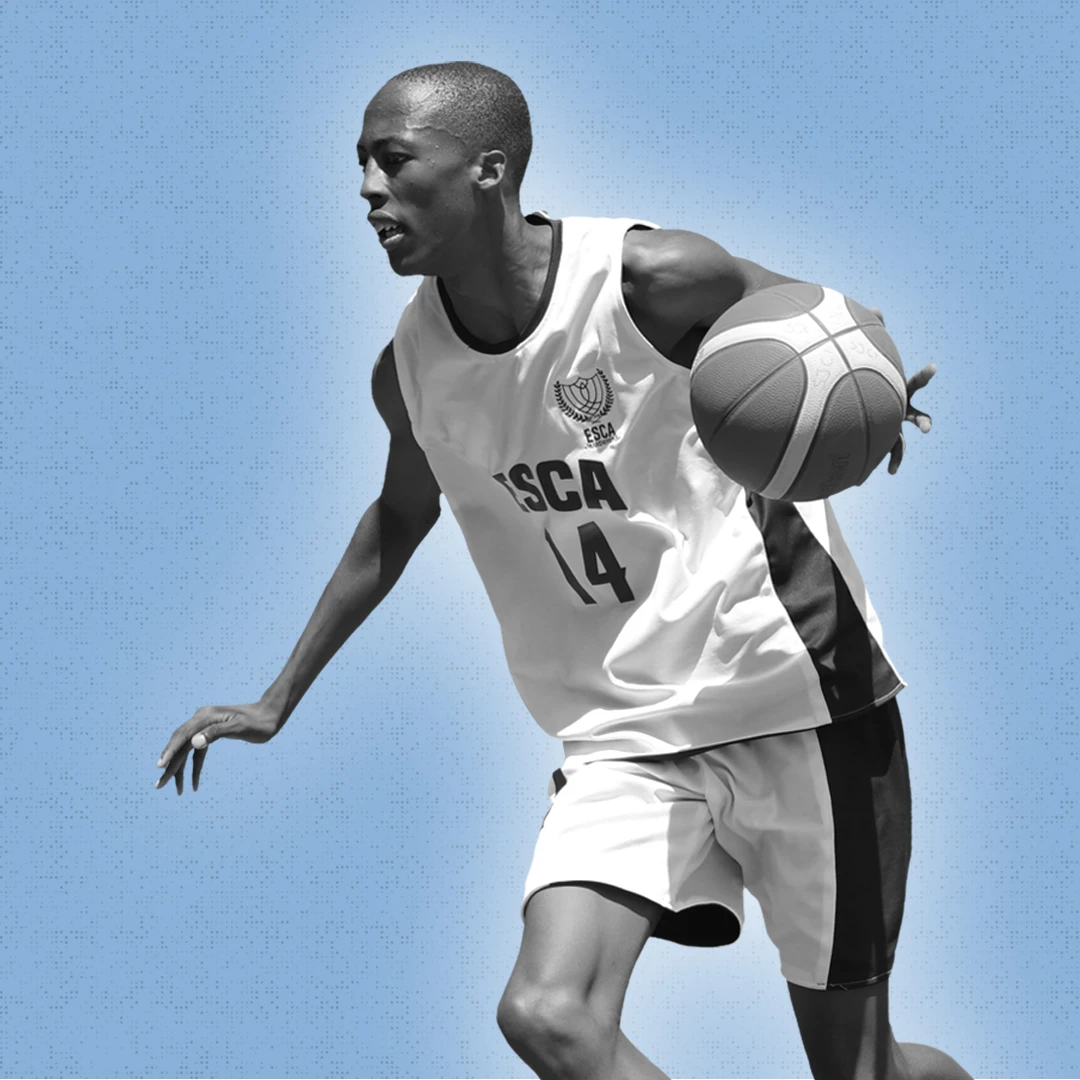 Two young men in white shirts holding basketballs against a dark background, one spinning a ball on his finger and the other smiling while holding a basketball.