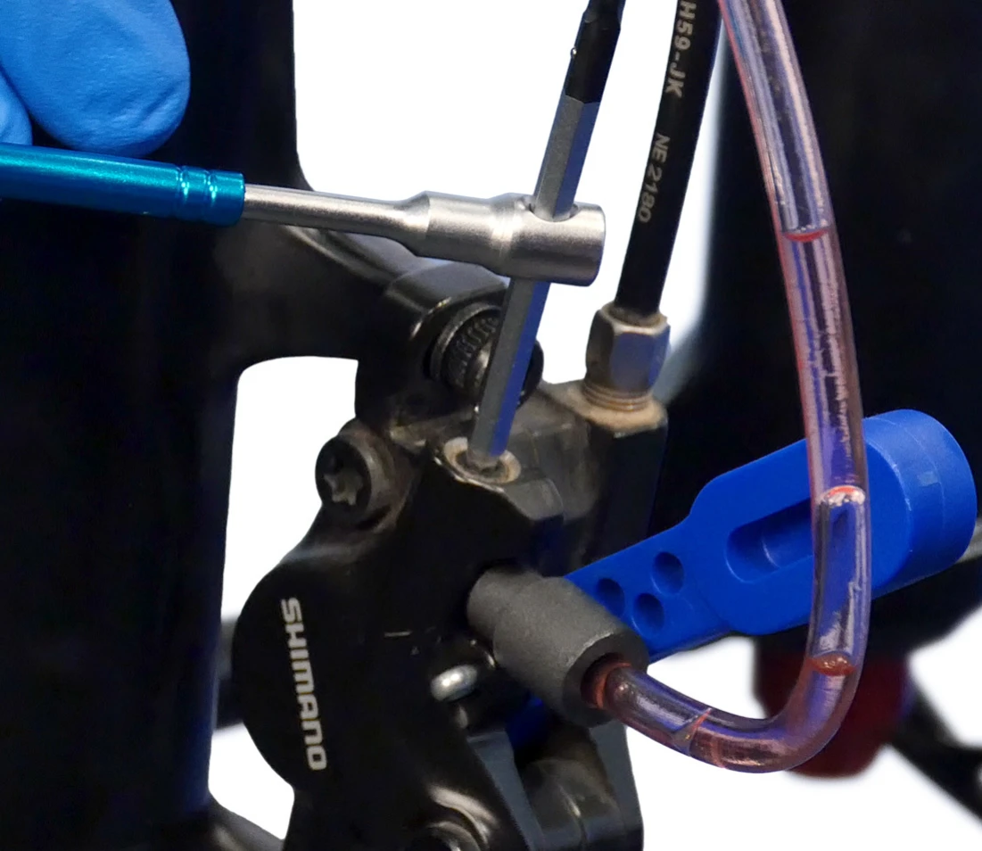 Bleed funnel (with adapter) installed into the bleed port