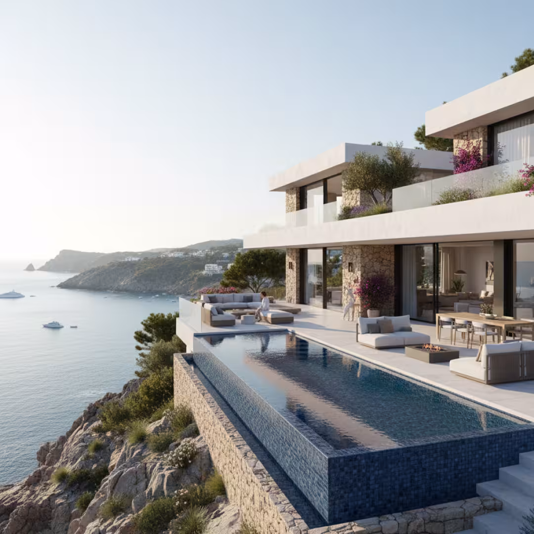 Casa moderna con piscina infinita sobre un acantilado con vista al mar y muebles de exterior.
