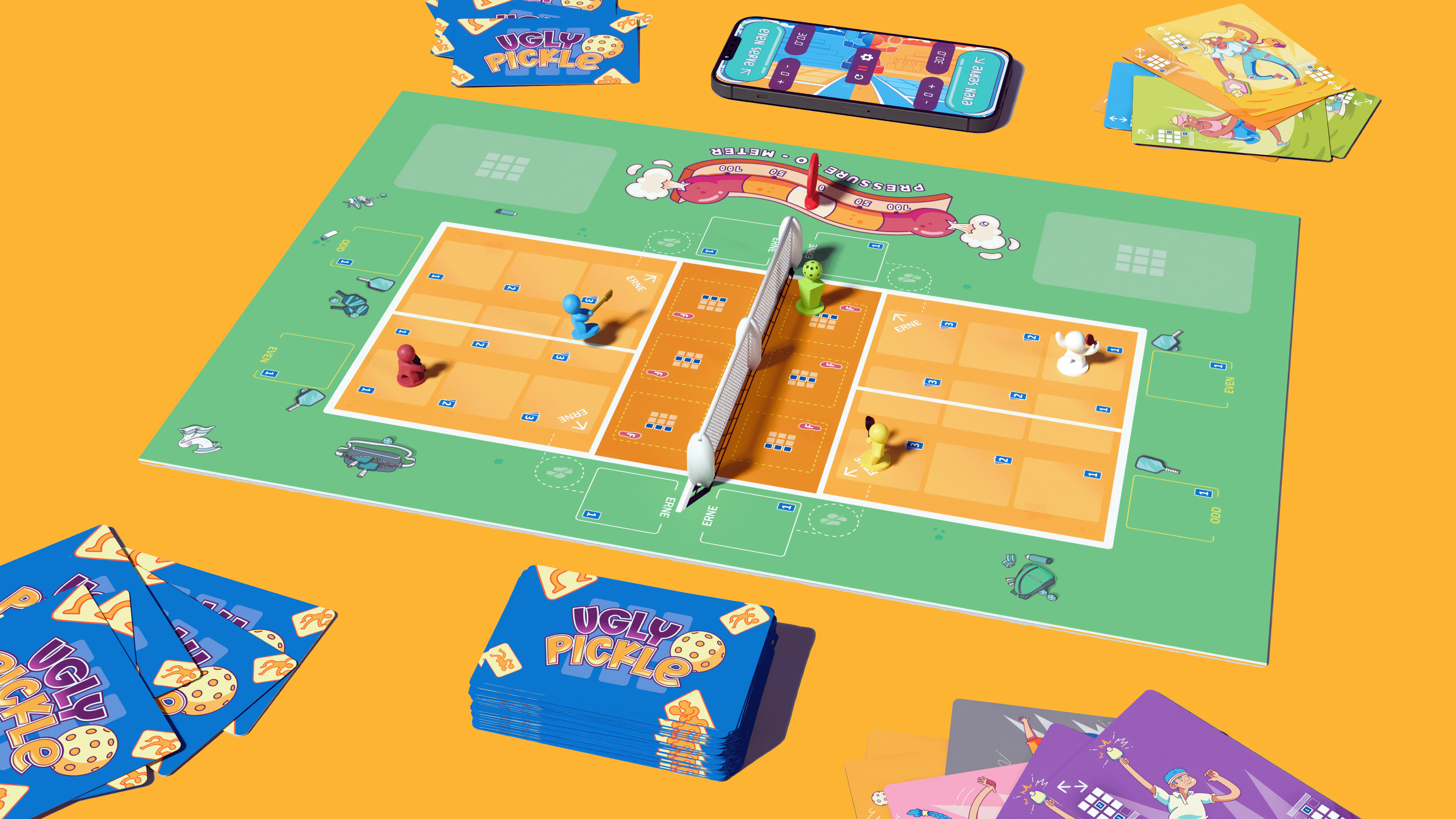 Colorful Ugly Pickle board game setup with game board, character pieces, cards, and a smartphone showing game controls on an orange background.