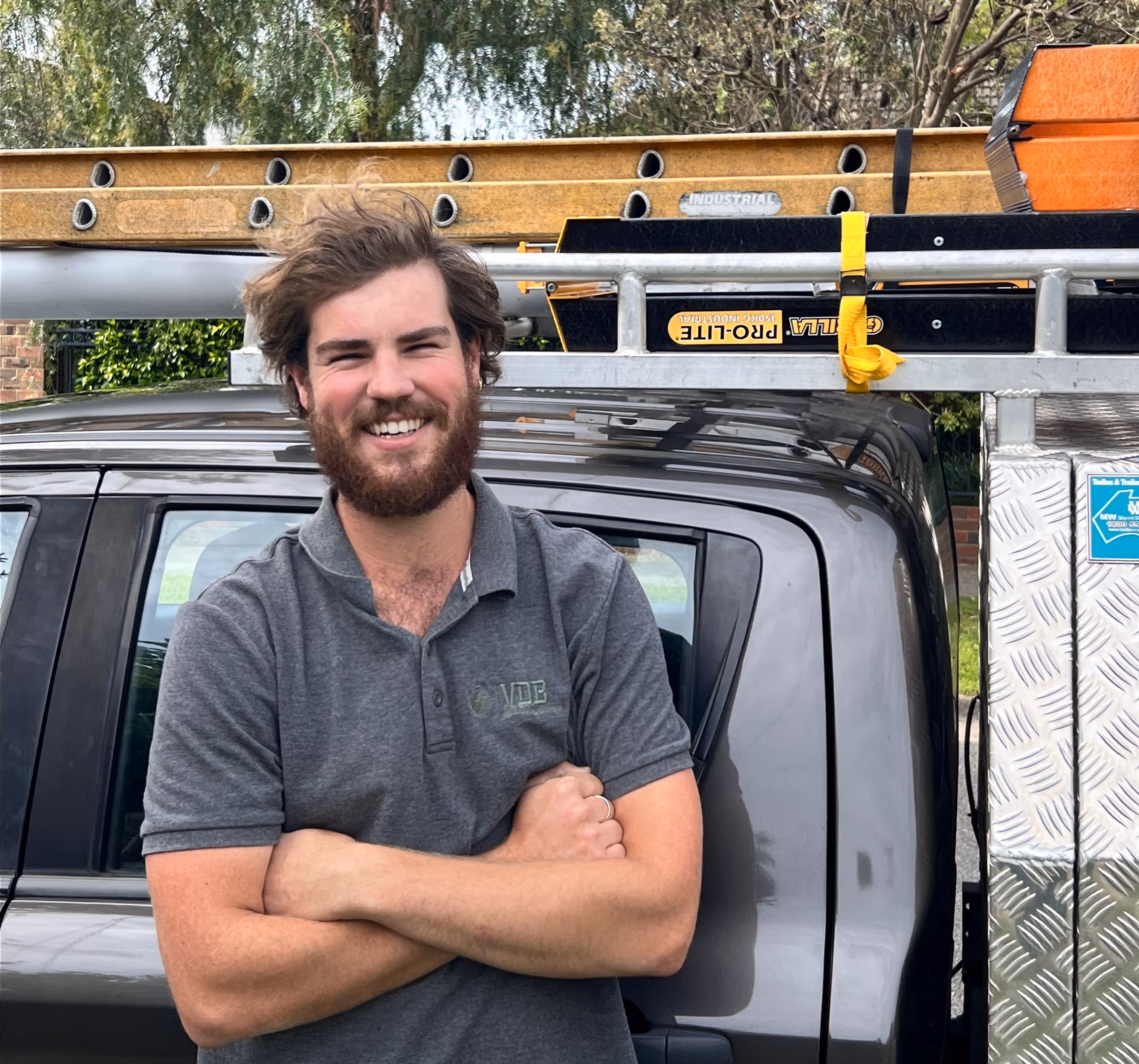 VDB Electrical Services Business Owner Smiling in front of truck 