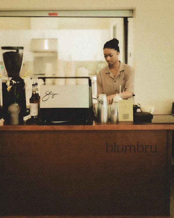 barista setting up coffee cart for corporate event