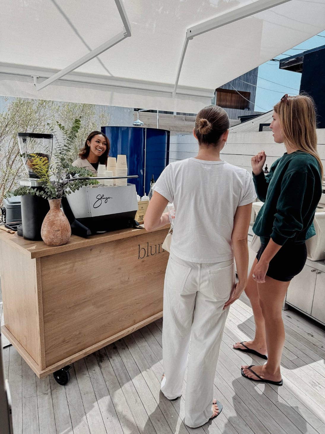 barista setting up coffee cart for brand activation event