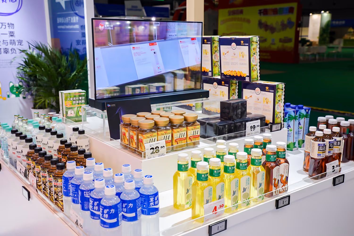 Brightly lit room with white walls featuring shelves filled with colorful snack packages arranged in rows.