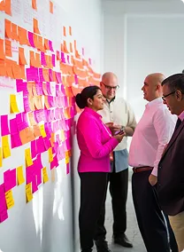 Launchist team discussing with a client in a meeting