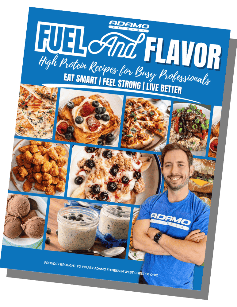 Book cover titled 'Fuel and Flavor' featuring high protein recipes with images of various healthy meals and a smiling man in a blue Adamo Fitness shirt.