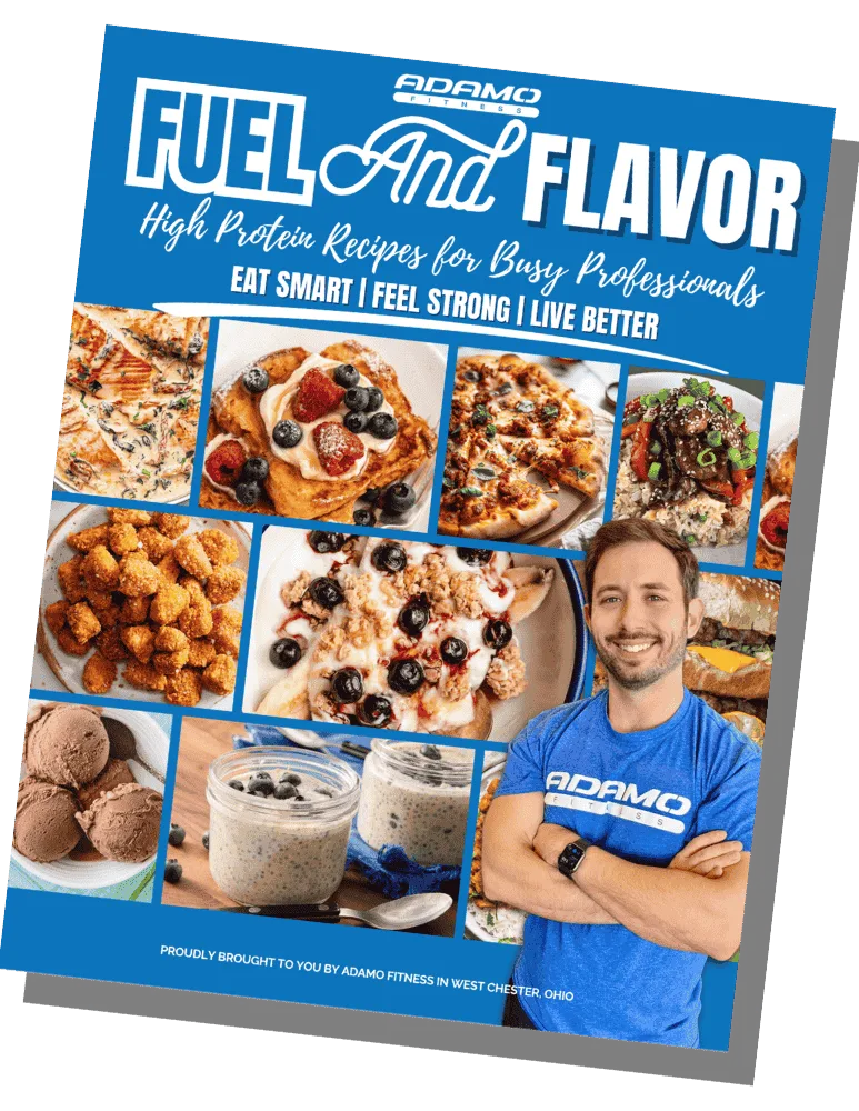 Book cover titled 'Fuel and Flavor' featuring high protein recipes with images of various healthy meals and a smiling man in a blue Adamo Fitness shirt.