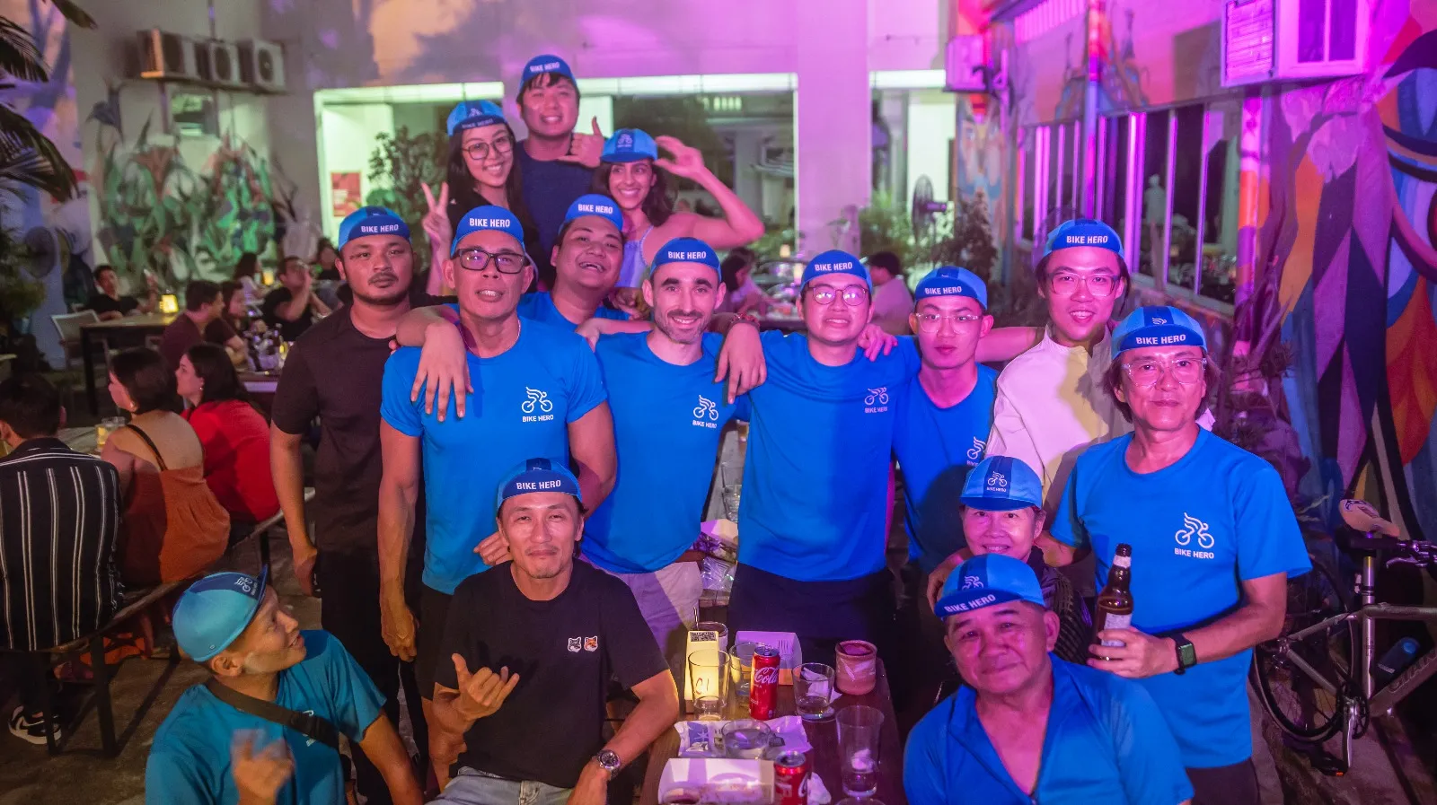 The Bike Hero crew together at a barbecue night in Singapore