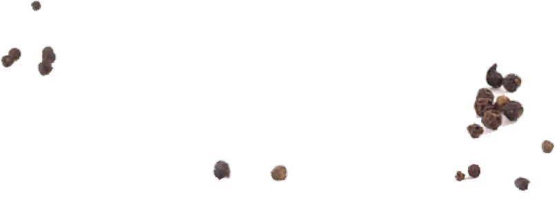 Scattered black peppercorns on a transparent background.