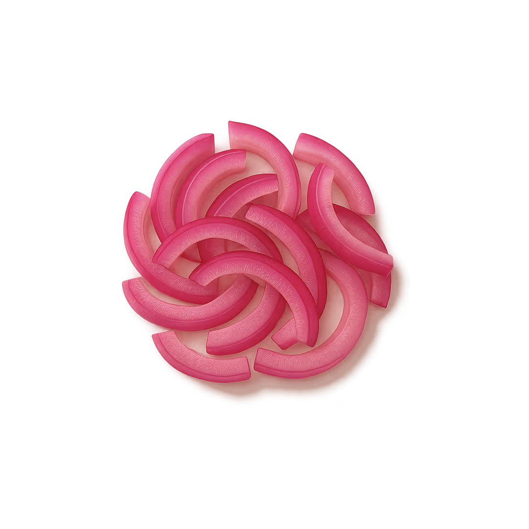 Sliced pickled red onions arranged in a circular pattern on a white background.