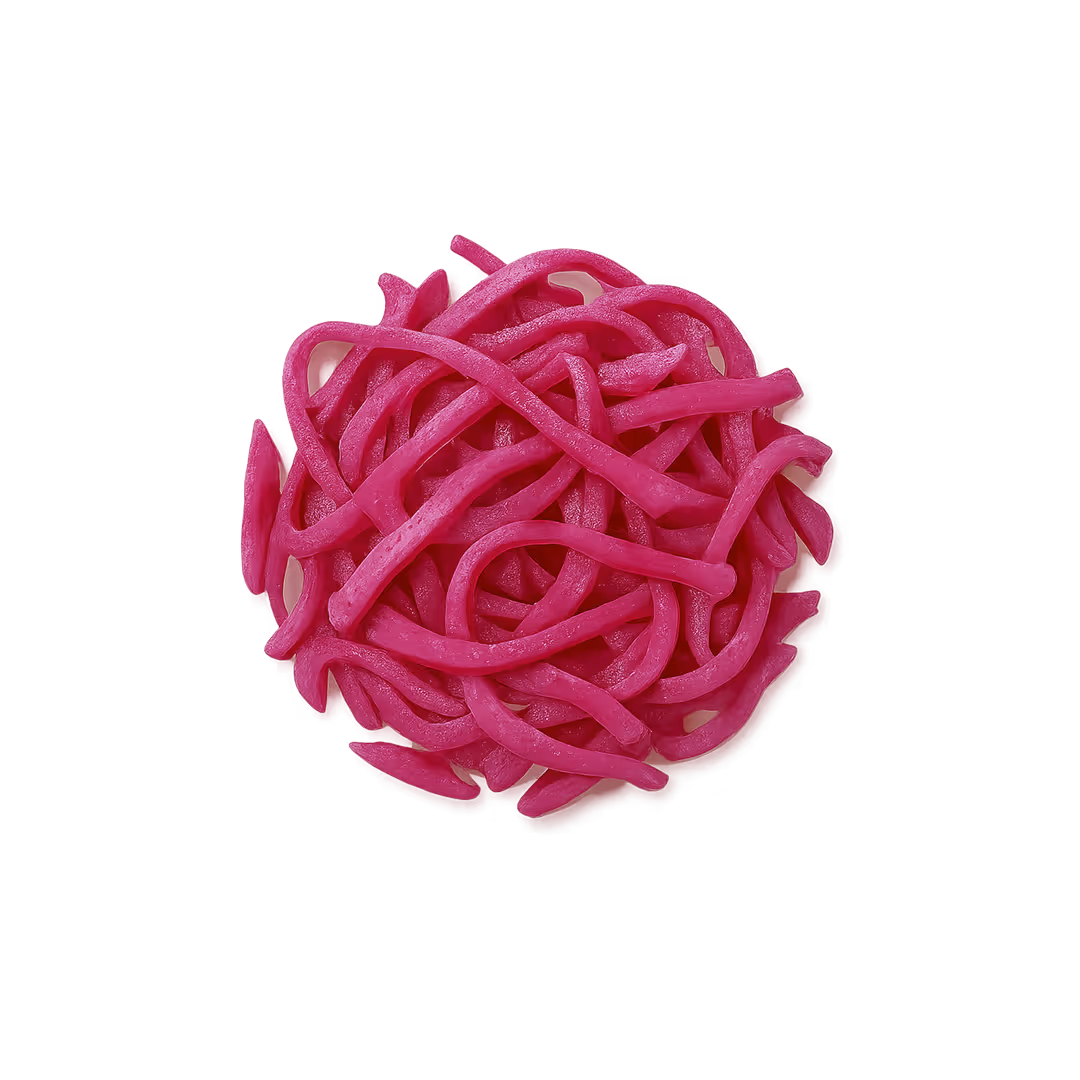 Cluster of bright pink pickled red cabbage strips on a white background.