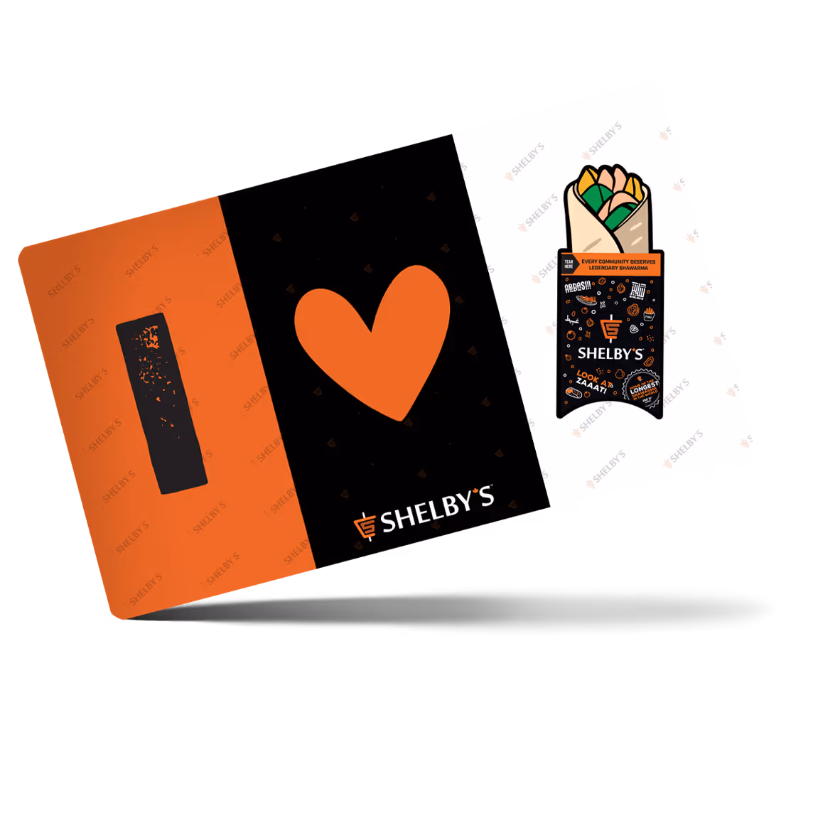 Freshly prepared Shelby's Legendary Shawarma sandwich featuring tender marinated meat, fresh vegetables, and flavorful sauces served in warm pita bread.