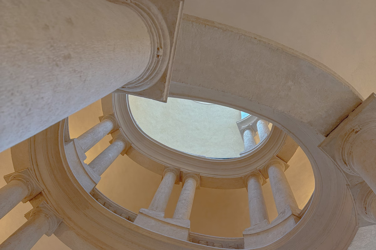 Stairway view of iconic columns at Palazzo Barberini in Rome, Italy