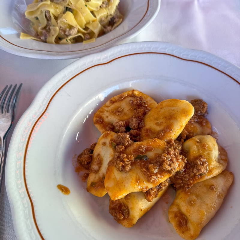 A plate of tordelli pasta.
