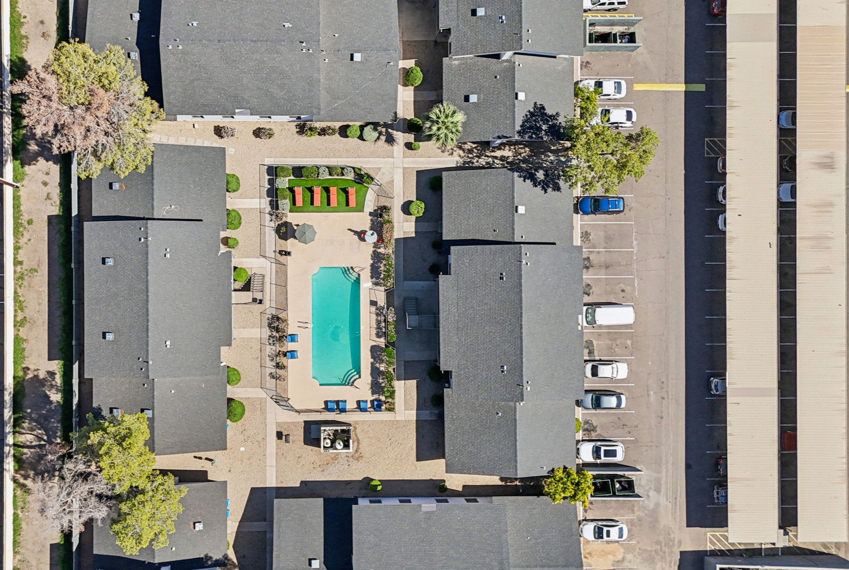 Aerial view of Swimming pool with orange lounge chairs