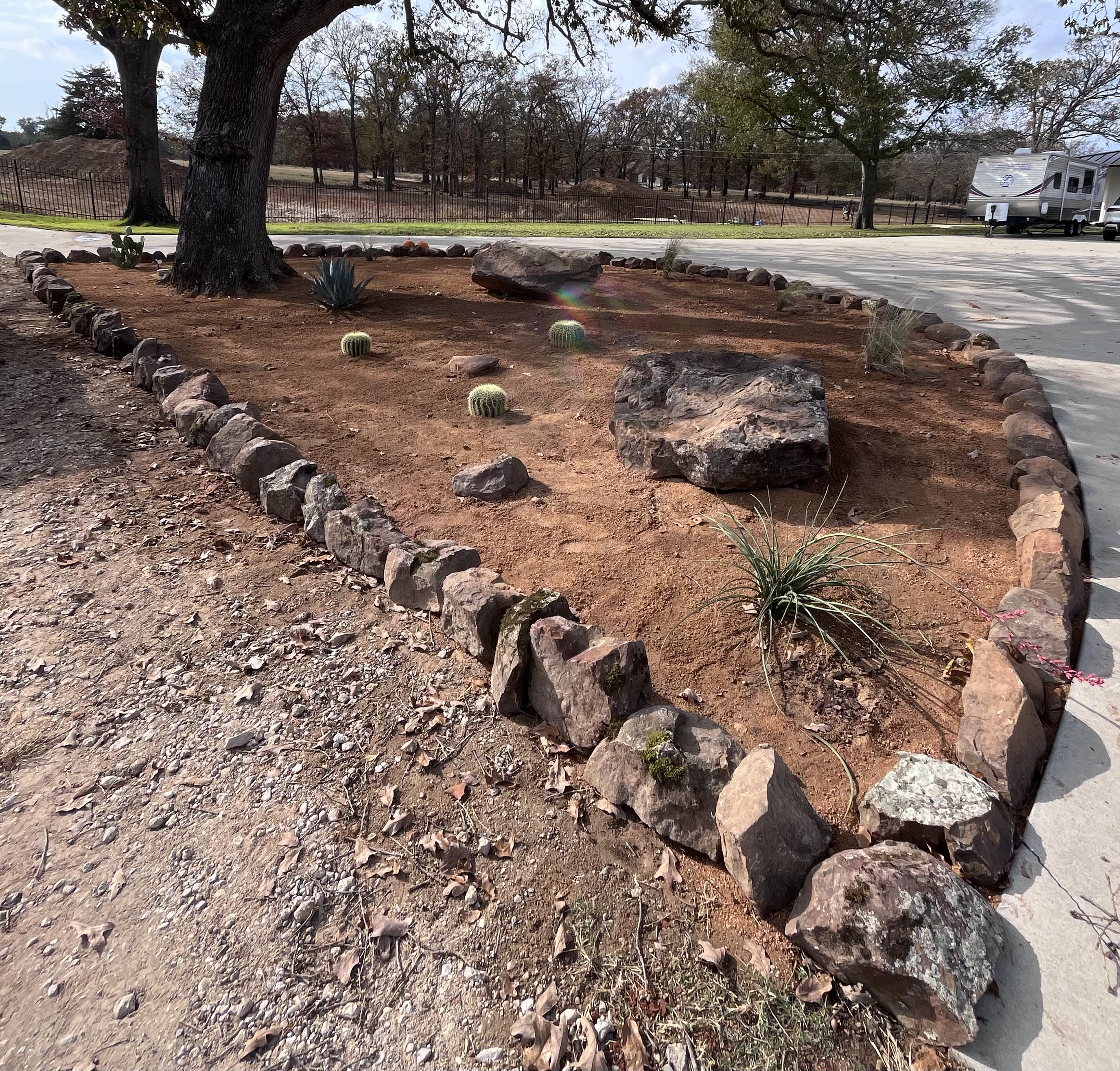 Saddle Rock landscape construction and site preparation in East Texas