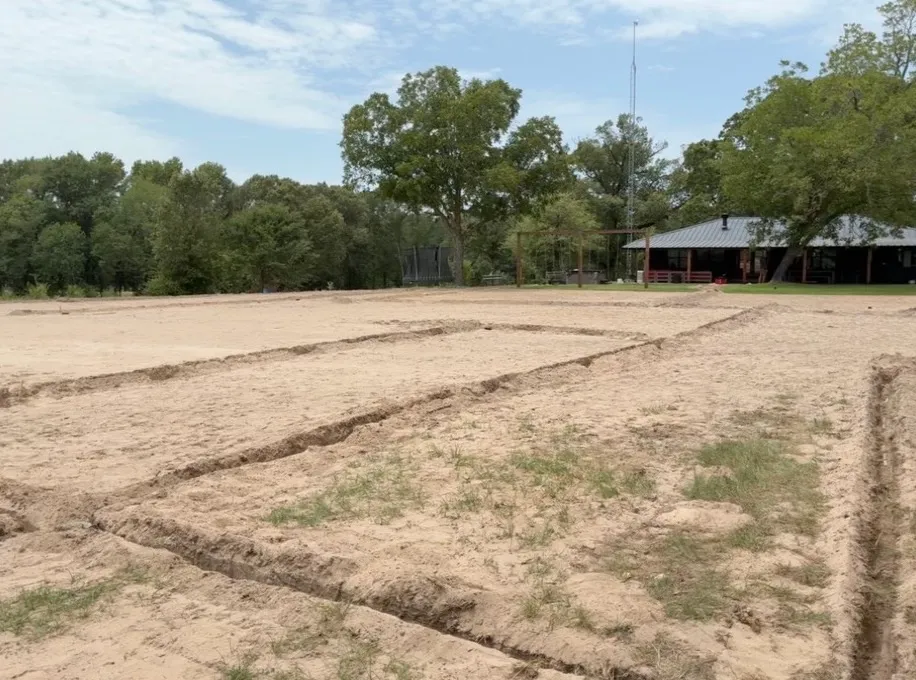 Irrigation installation in progress on an East Texas property