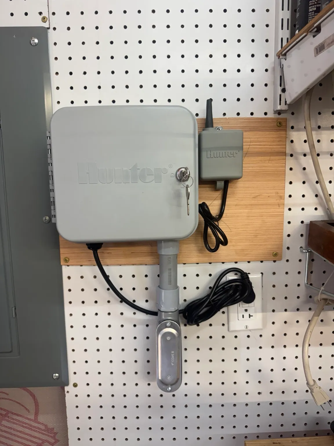 Irrigation controller and receiver mounted during a Saddle Rock installation