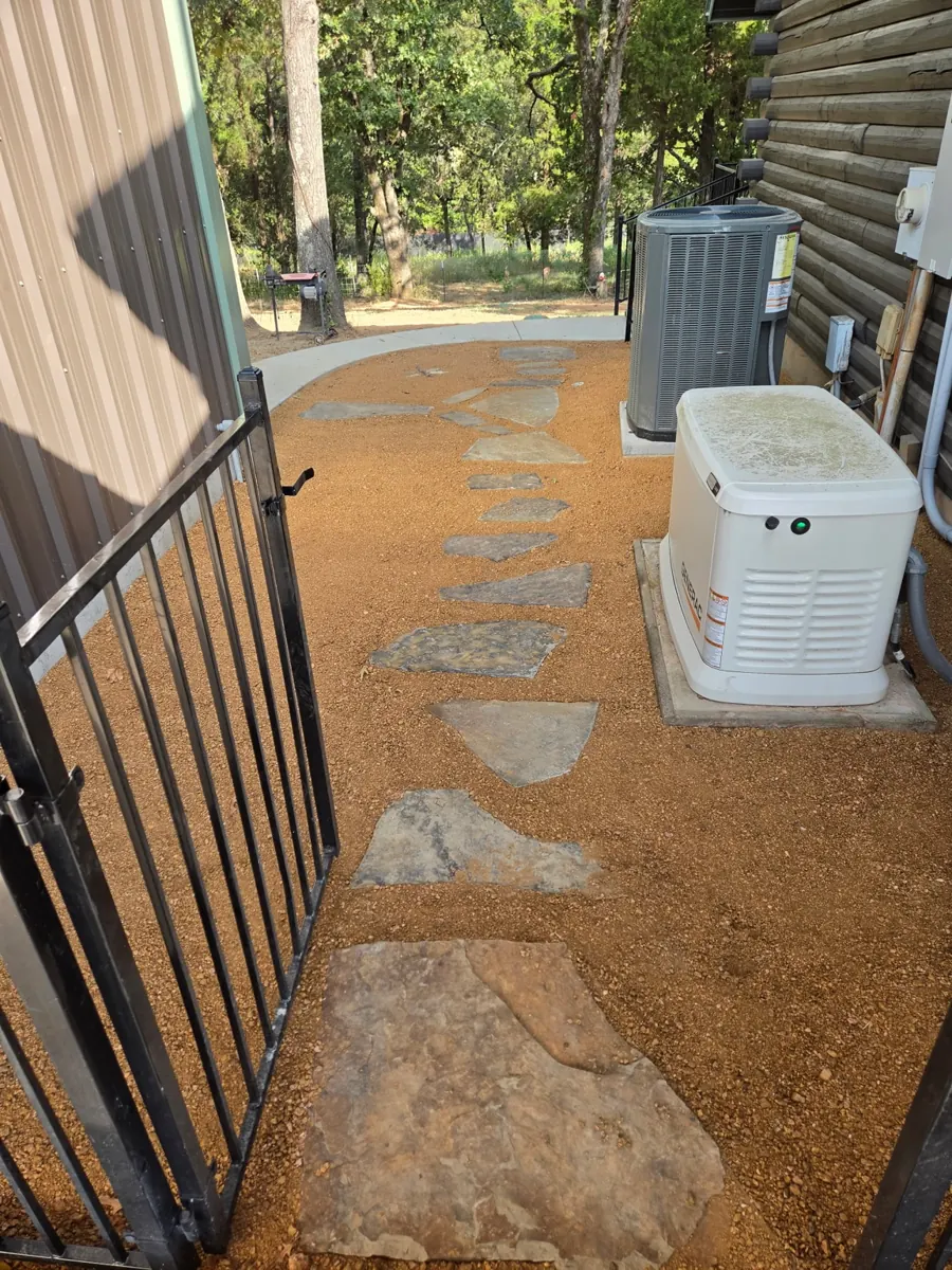 Flagstone stepping path set in decomposed granite between existing structures