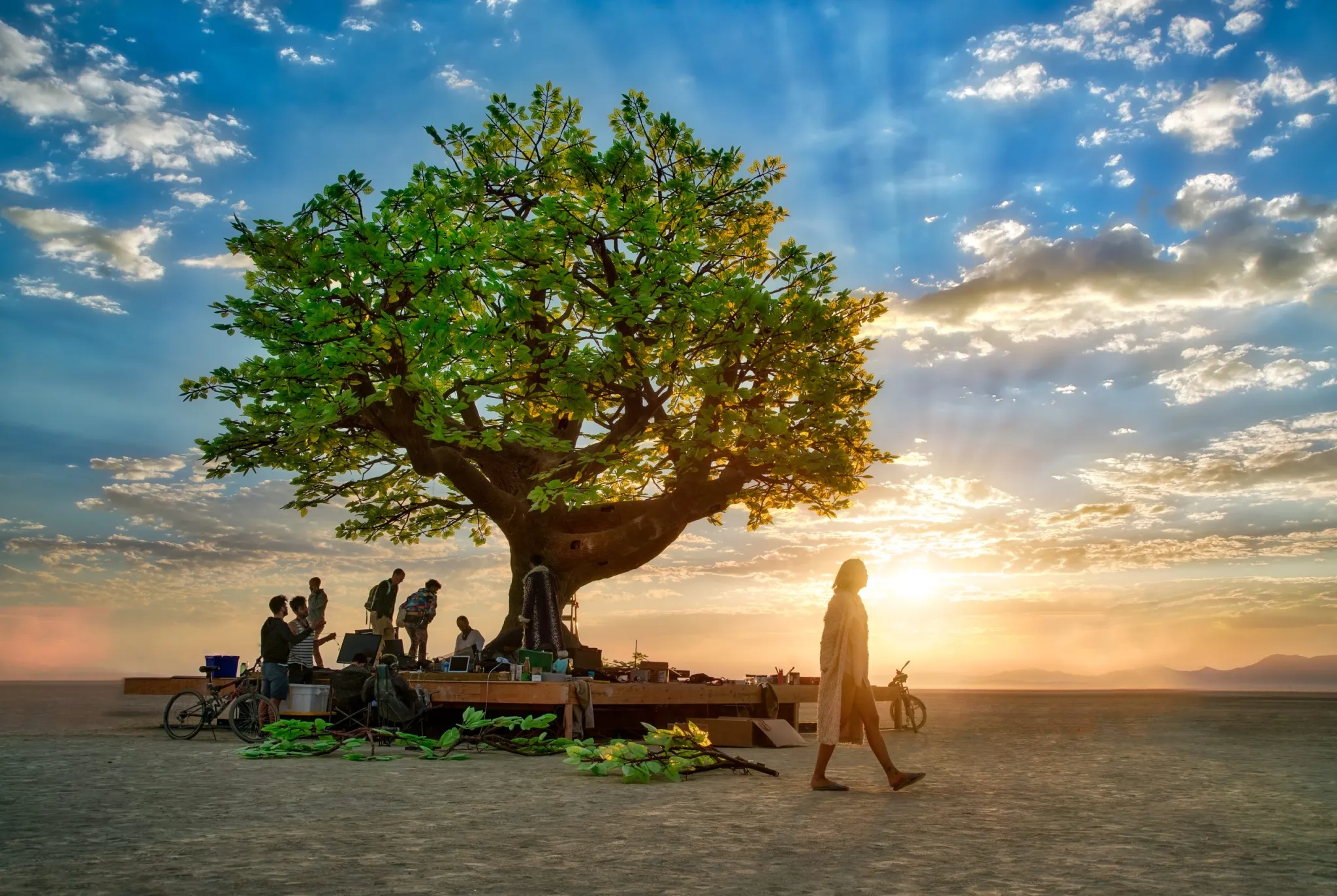 Visitors gathered around Tree of Ténéré at Burning Man at night