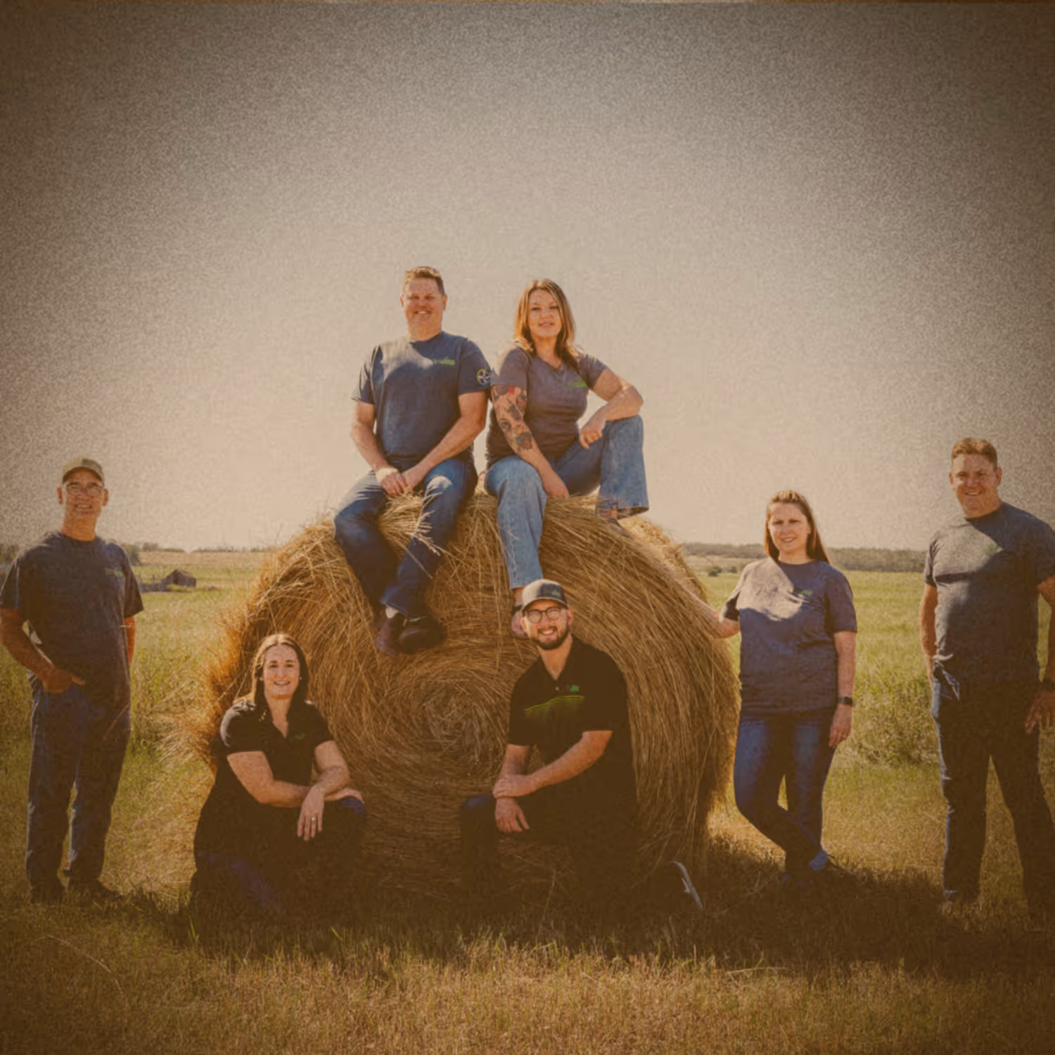 Labouring standing in front of Elevation Ag truck