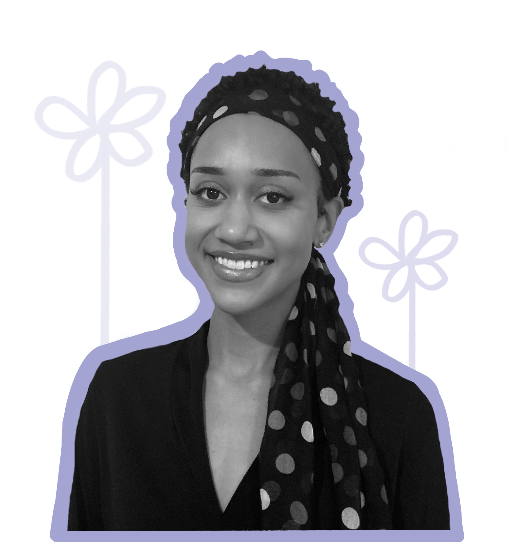 Genesis smiling with flowers behind her