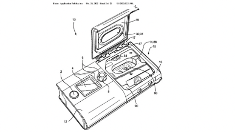 Diagram of an open medical diagnostic device showing a sample chamber and control panel with labeled components.