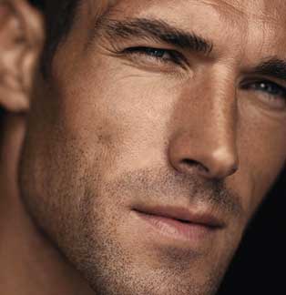 Portrait of a man with stubble, representing men's health and testosterone therapy