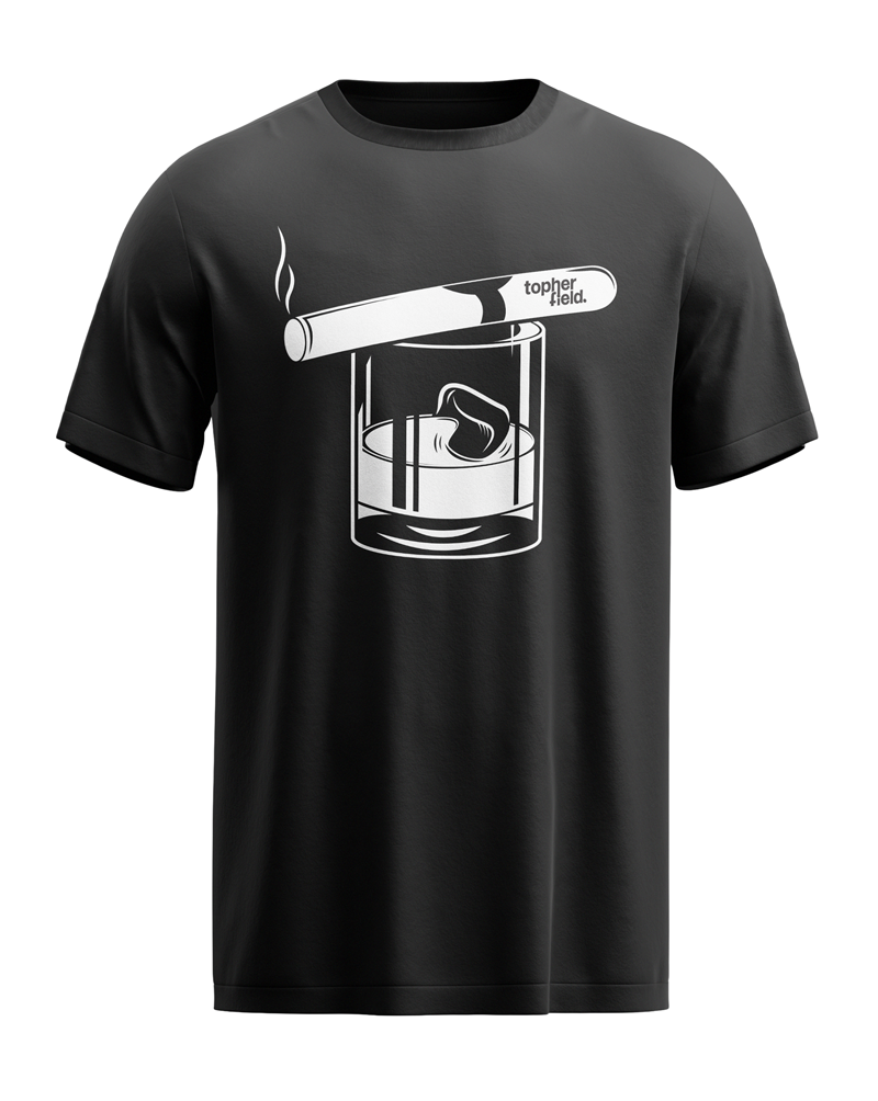 Black t-shirt featuring a hand holding a lit cigar above a whisky glass, with the Topher Field logo printed on the sleeve.