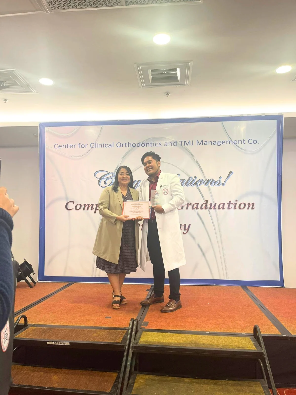 Smart logo with a green, blue, and light green triangular design next to the word 'Smart' in green letters.