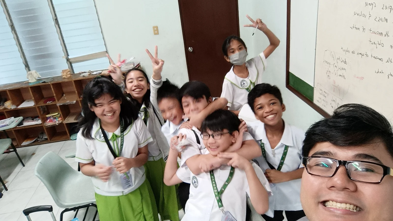 Smart logo with a green, blue, and light green triangular design next to the word 'Smart' in green letters.