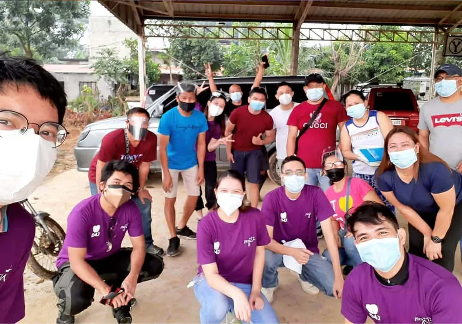 Smart logo with a green, blue, and light green triangular design next to the word 'Smart' in green letters.