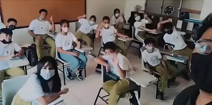 Smart logo with a green, blue, and light green triangular design next to the word 'Smart' in green letters.