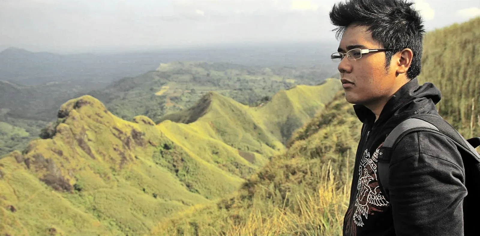 Smart logo with a green, blue, and light green triangular design next to the word 'Smart' in green letters.