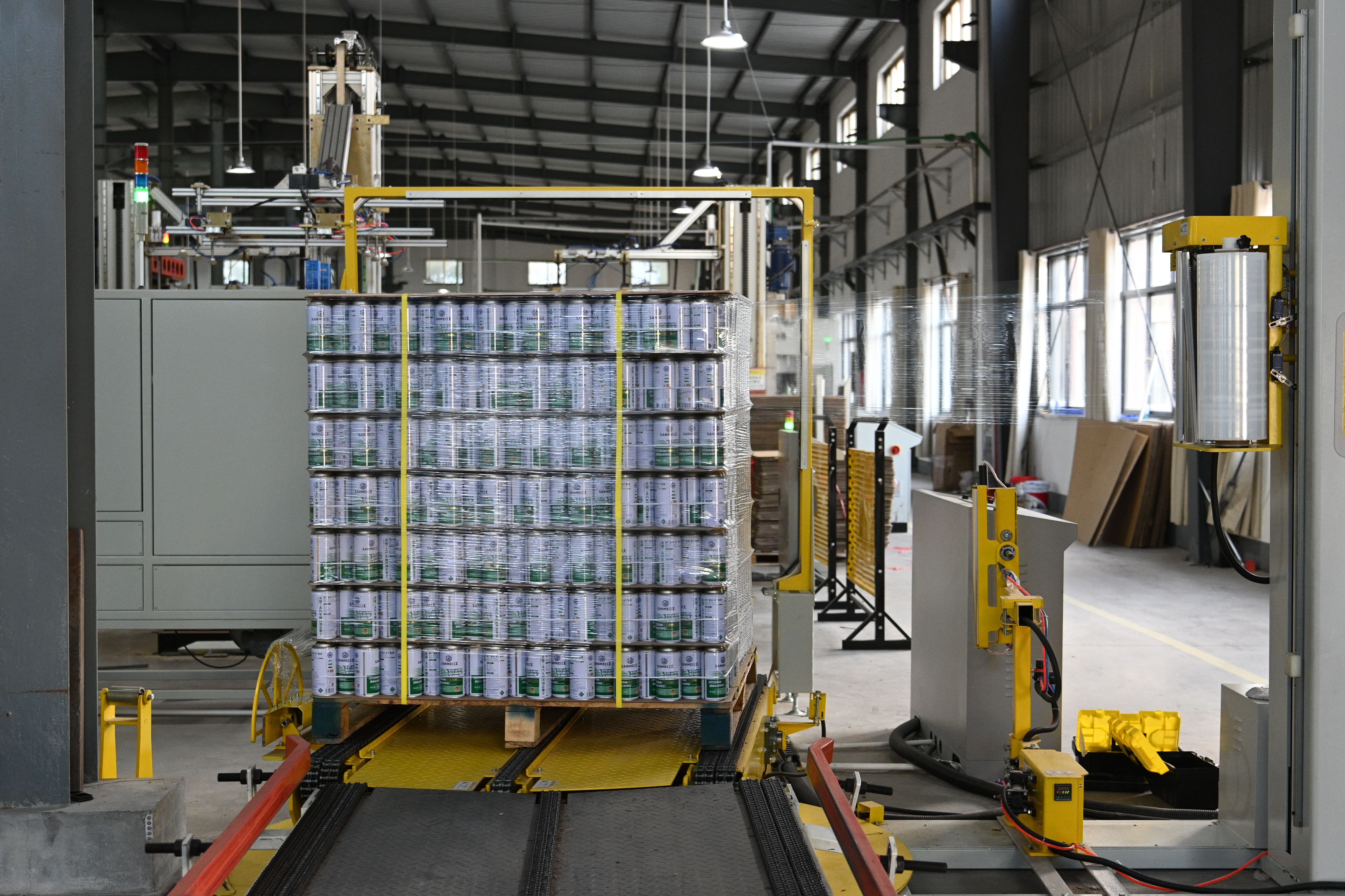 image of workers at machining station: scene 1