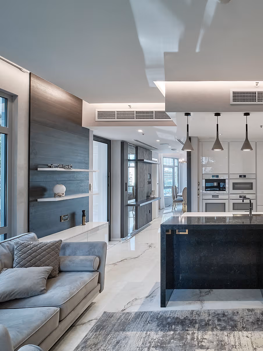 Modern open kitchen and living area in The Residences Downtown Dubai apartment renovation